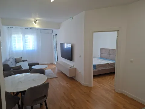 Bright living room with a dining area and a view of the bedroom. - image 3