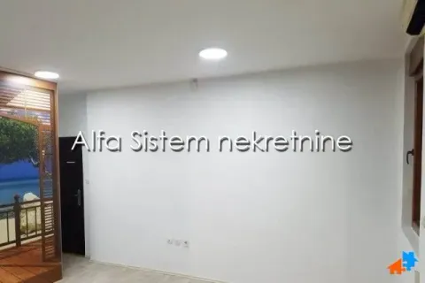 Empty room with white walls and recessed lighting. - image 6