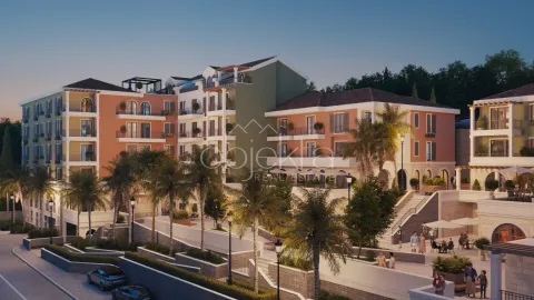 View of the exterior of the residential complex with a landscaped courtyard and palm trees. - image 6