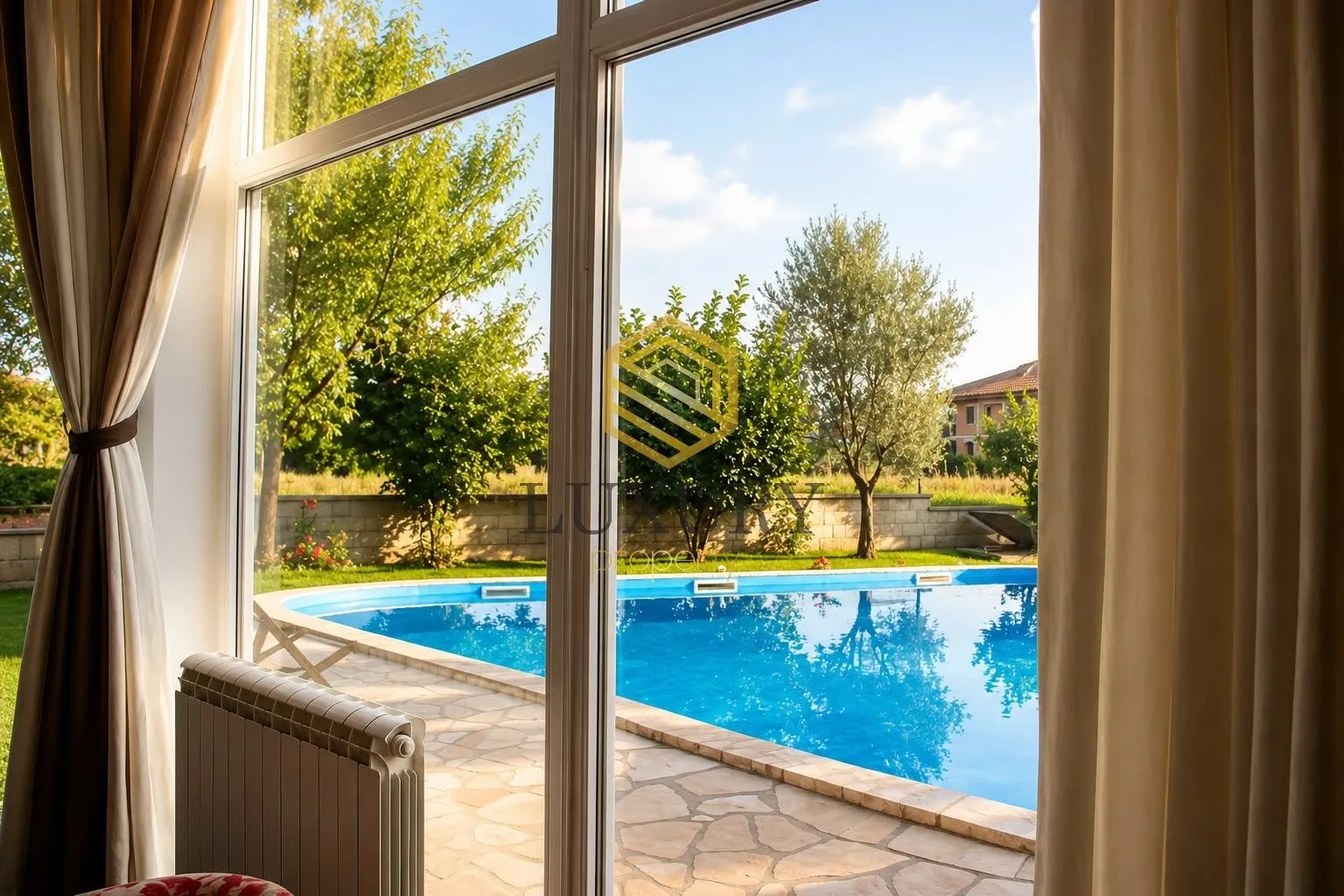 Interior view of the yard with a swimming pool and greenery.