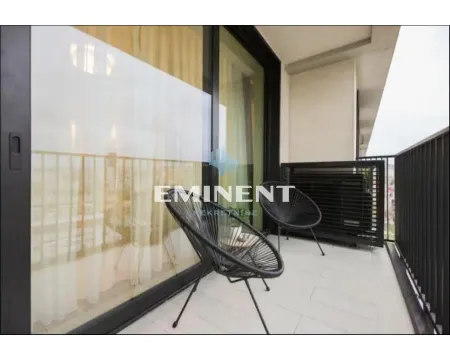 Furnished balcony with seating set and a view. - image 20