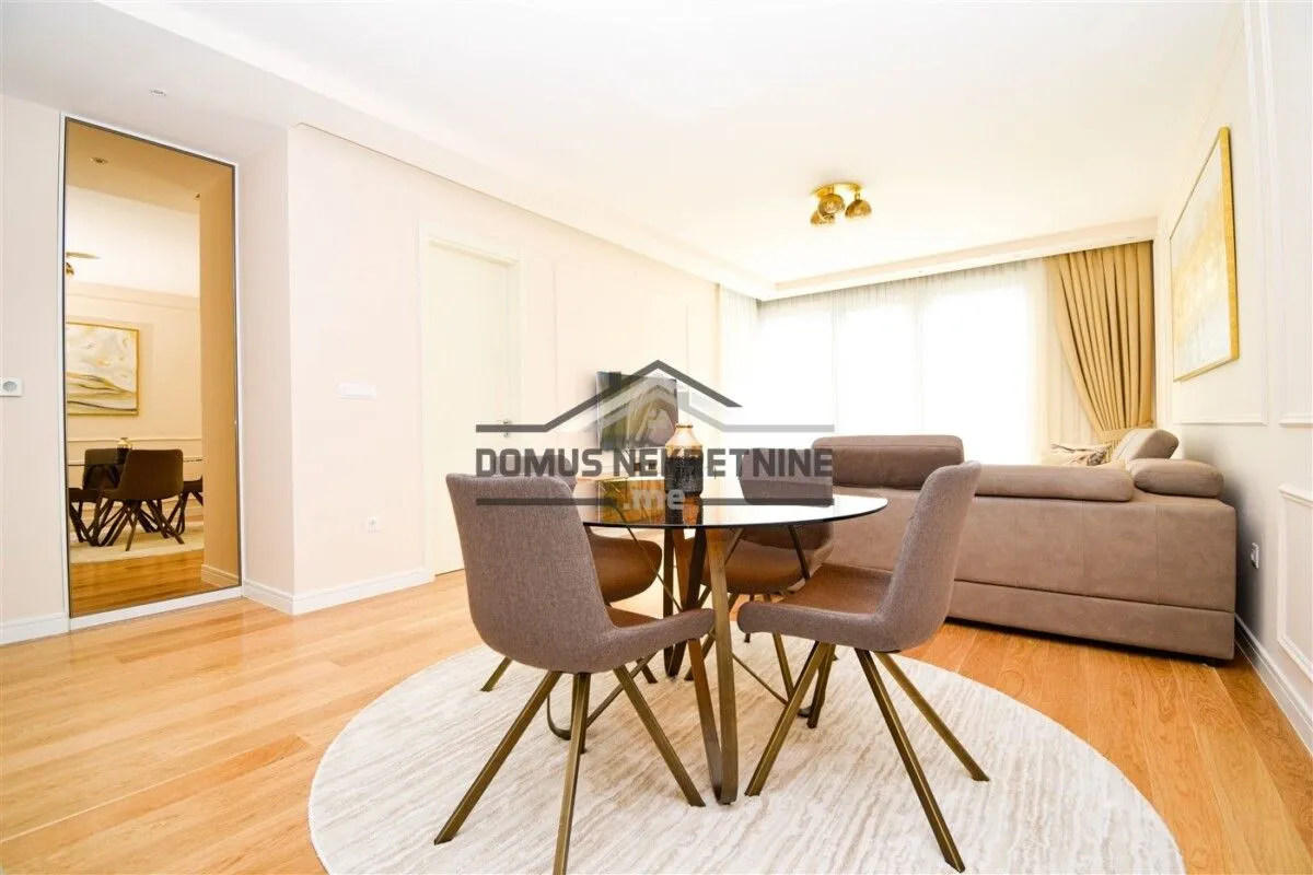 Living room with a dining table and chairs.