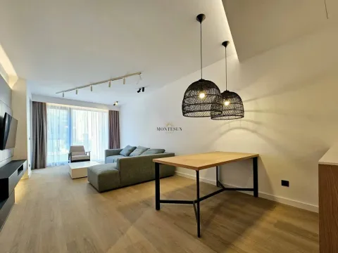 Modern living room with a dining table and recessed lighting. - image 8