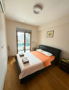 Furnished bedroom with a double bed and access to the terrace. - image 10