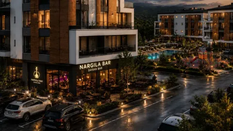 Pogled na spoljašnjost moderne stambene zgrade sa poslovnim prostorom u prizemlju i bazenom u dvorištu. - image 7