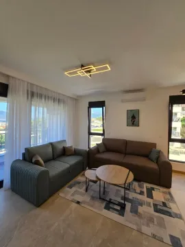 Living room with sofas, coffee table and access to the terrace. - image 7