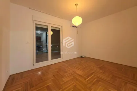 Empty room with hardwood floors and access to the terrace. - image 10