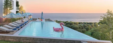 Outdoor swimming pool with sun loungers and sea view. - image 6