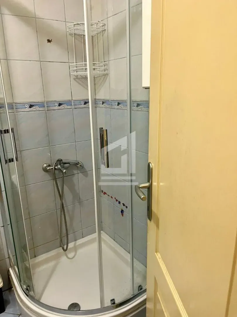 View of the shower cabin in the bathroom.