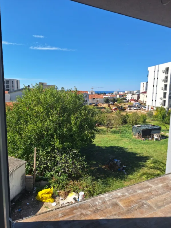 View of the surroundings and greenery from the terrace of the building.