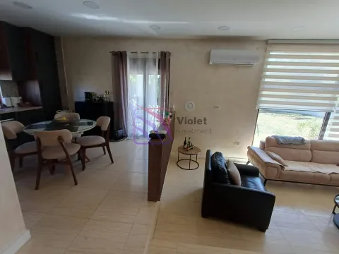 Spacious living room connected to the dining area and kitchen. - image 10