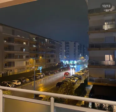 Night view of the city street and buildings from the terrace. - image 12