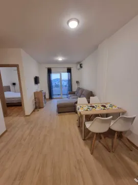 Living room with dining area and a view of the terrace. - image 8