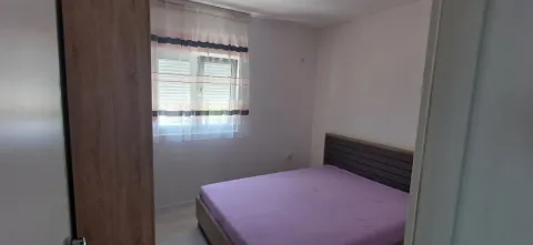 Smaller bedroom with a double bed and a window. - image 7