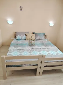 Furnished bedroom with a double bed. - image 5