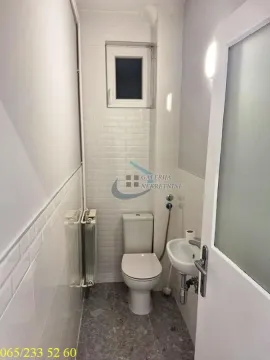 Small bathroom with toilet and washbasin. - image 9