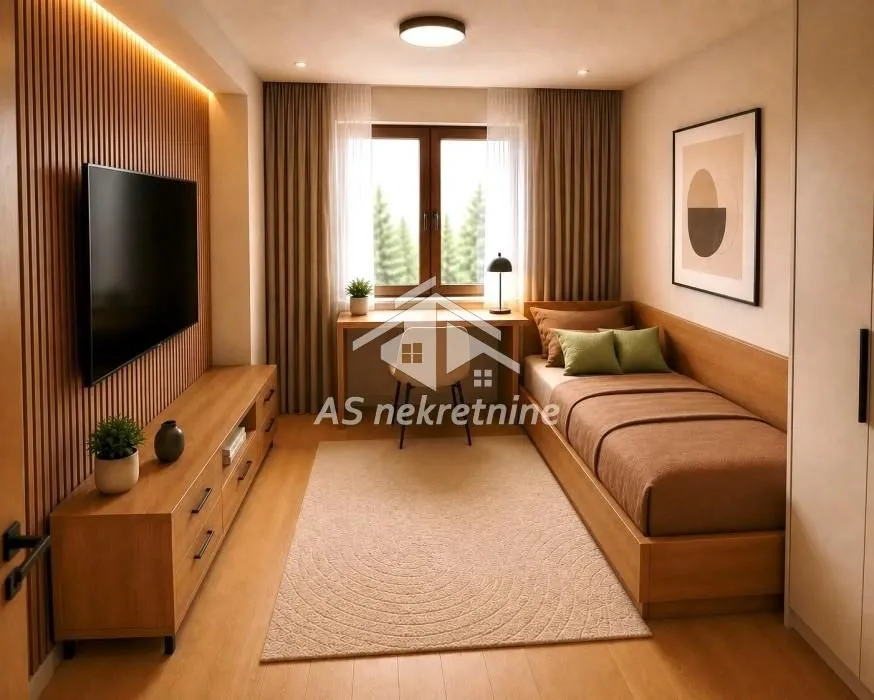 Small bedroom with a bed, wall-mounted TV, and a desk under the window.