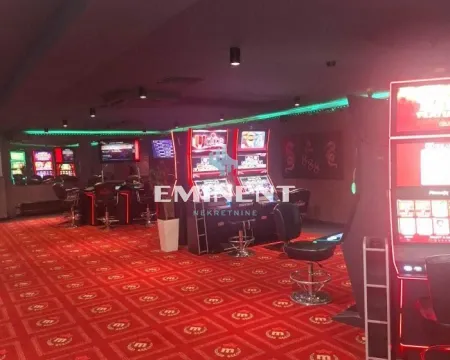 Interior of a commercial space equipped as a casino with slot machines. - image 4