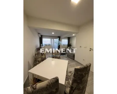 Living room with dining table and chairs. - image 4