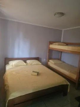Bedroom with a double bed and a bunk bed. - image 2