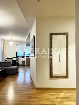 View of the living room and hallway with parquet flooring. - image 4