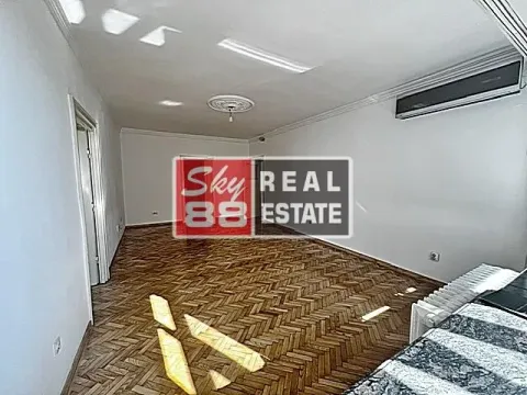 Empty living room with parquet flooring and air conditioning. - image 7