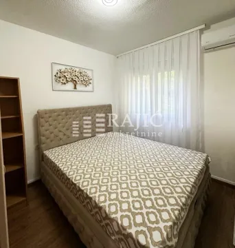 Furnished bedroom with a double bed. - image 11