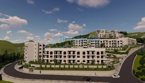 Spoljašnji izgled stambenog kompleksa sa više zgrada i uređenim okruženjem. - image 7