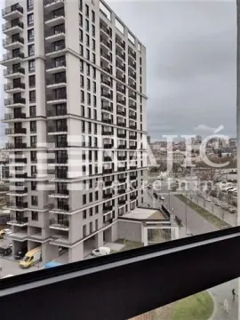 View from the terrace of a multi-story residential building and surroundings. - image 13