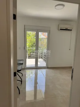 Empty bright room with access to the terrace and an air conditioner. - image 15