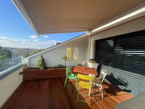 Furnished terrace with wooden flooring, seating set, and an awning. - image 19