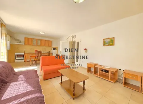 Spacious living room connected to the dining area and kitchen. - image 14