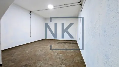 Empty room with tiled flooring and white walls. - image 8