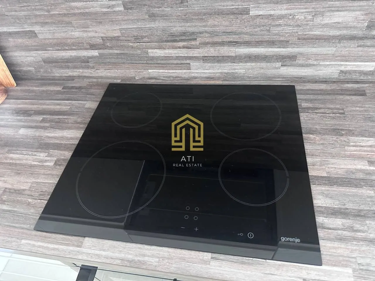 View of a built-in ceramic cooktop on a kitchen countertop.