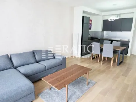 Living room connected to the dining area and kitchen. - image 3