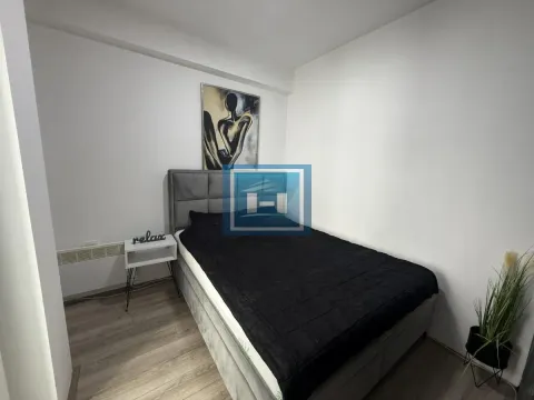 Furnished bedroom with a double bed. - image 6