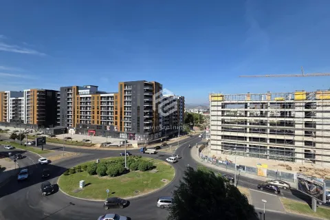View from the balcony of the roundabout and surrounding residential buildings under construction. - image 20