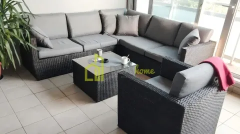 Furnished terrace with seating set and a small table. - image 6