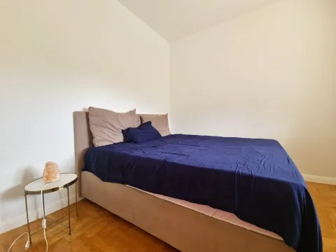 Bedroom with a double bed and a nightstand. - image 14