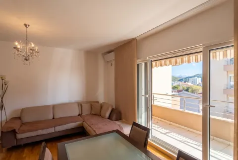 Spacious living room with a sectional sofa and access to the terrace. - image 8
