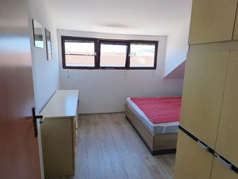 Small bedroom with a bed and a dresser. - image 6