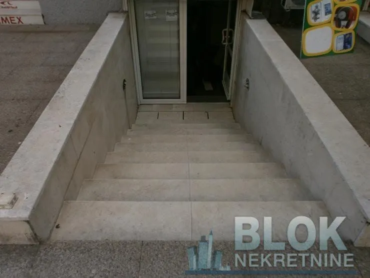 External stairs leading to the building entrance.