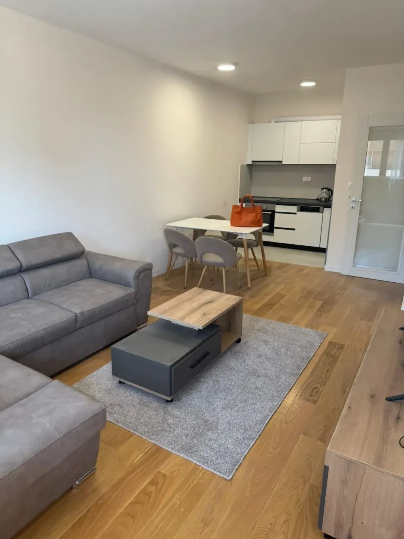 Living room connected to the dining area and kitchen.