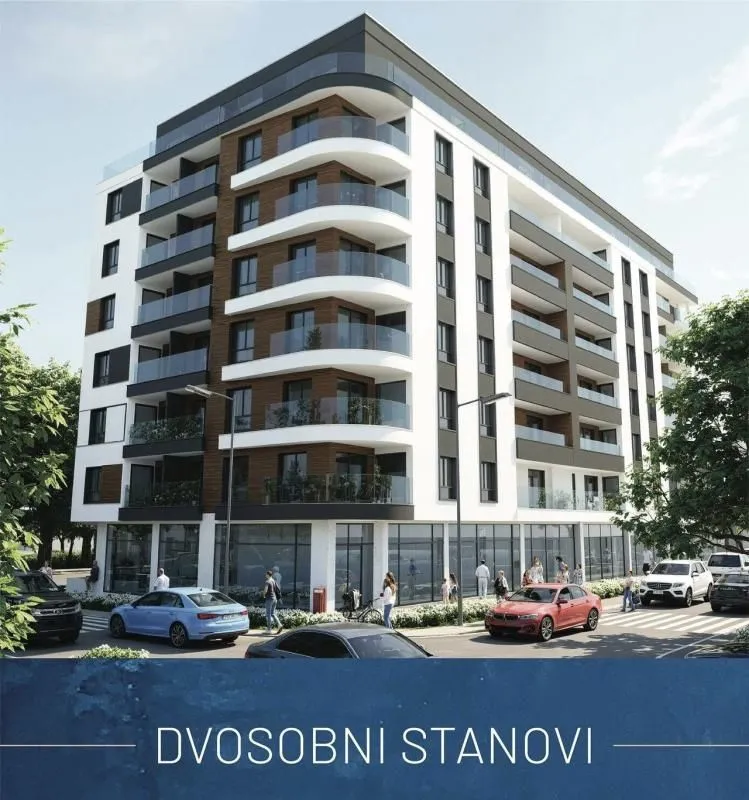 Spoljašnji izgled moderne višestambene zgrade sa terasama i ulica sa parkingom.