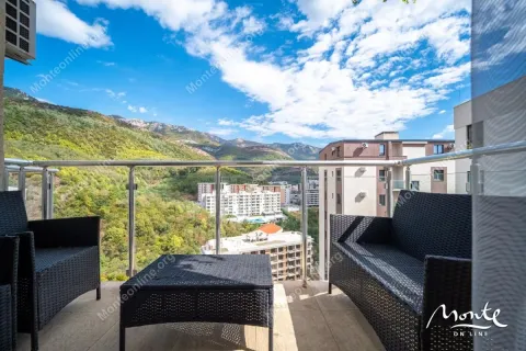 Furnished terrace with seating set and mountain view. - image 8