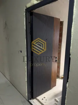Entrance door in an apartment under construction. - image 4