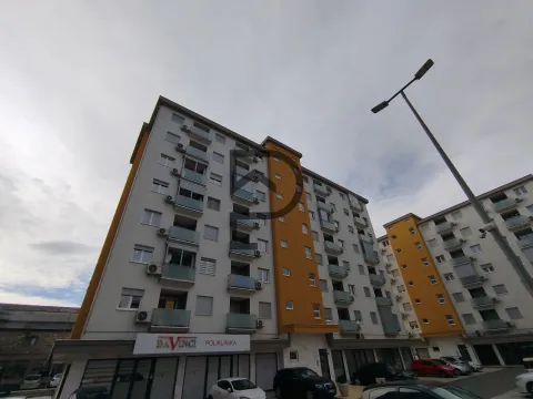 View of the exterior of a modern apartment building. - image 10