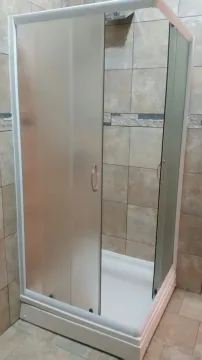 Modern shower cabin with glass doors in the bathroom. - image 5