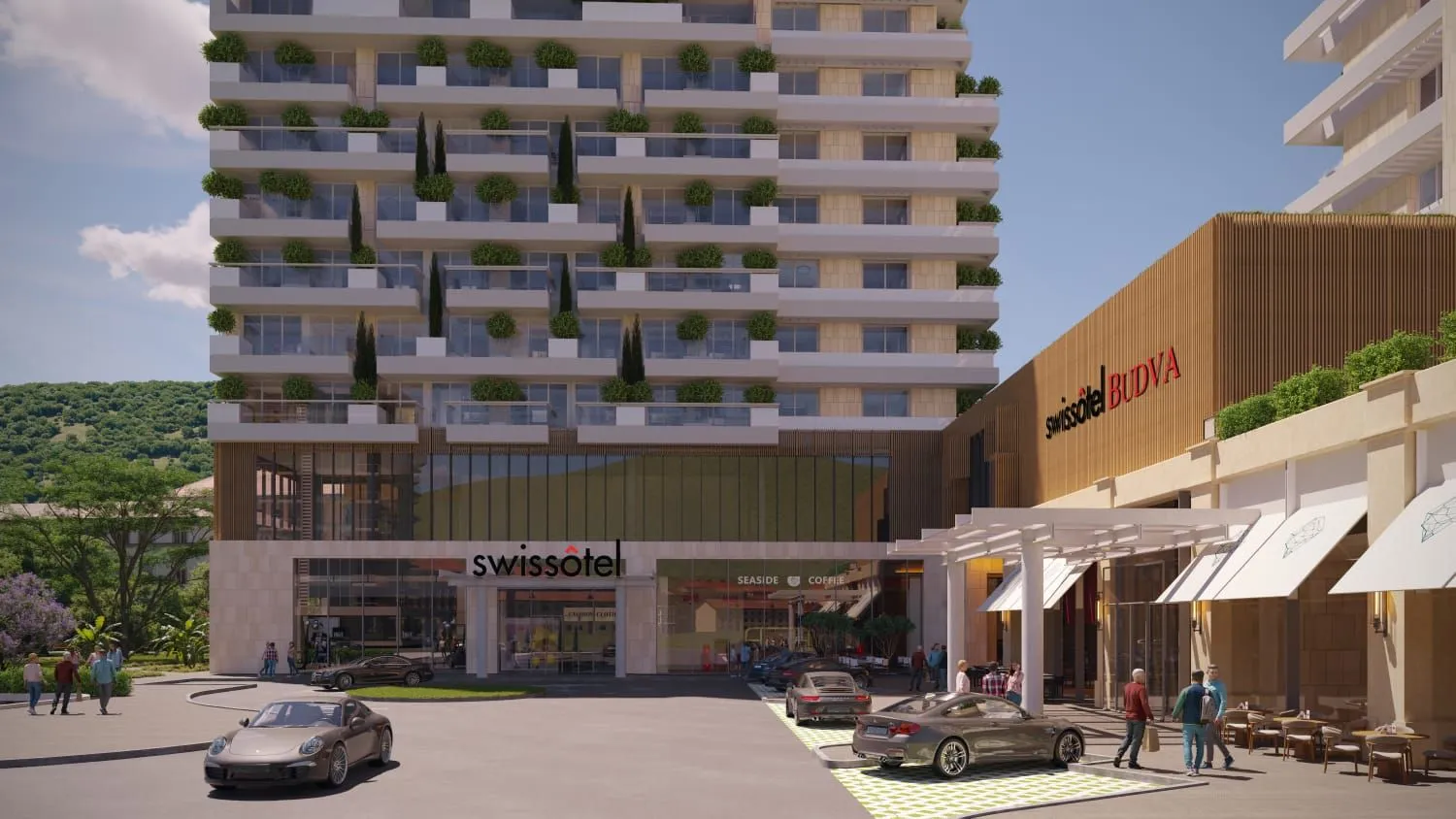 Pogled na eksterijer i ulaz u moderan hotelski kompleks sa terasama.