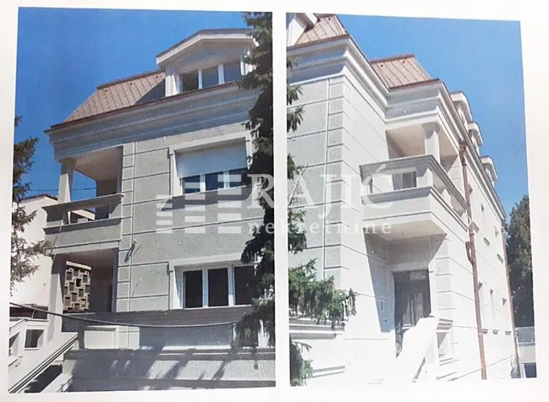 Exterior of a multi-family residential building with terraces.